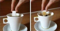 Une main plonge un sucre dans une tasse, Esprit Façades, Façadier dans l'Orne.